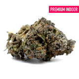 Dark Jokerz Indoor THCa Flower with dense trichomes, orange hairs, and dark green purple hues