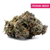 Dark Jokerz Indoor THCa Flower with dense trichomes, orange hairs, and dark green purple hues