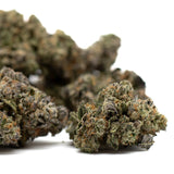 Dark Jokerz Indoor THCa Flower with dried cannabis buds, trichomes, and orange pistils