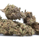 Dense greenish-brown dirty laundry thca flower full-term thca flower wholesale with visible trichomes and textured surface
