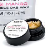 Black jar of Dosi Mango THCA Crumble Wax with 97.99% THC-A for premium hemp flower experience