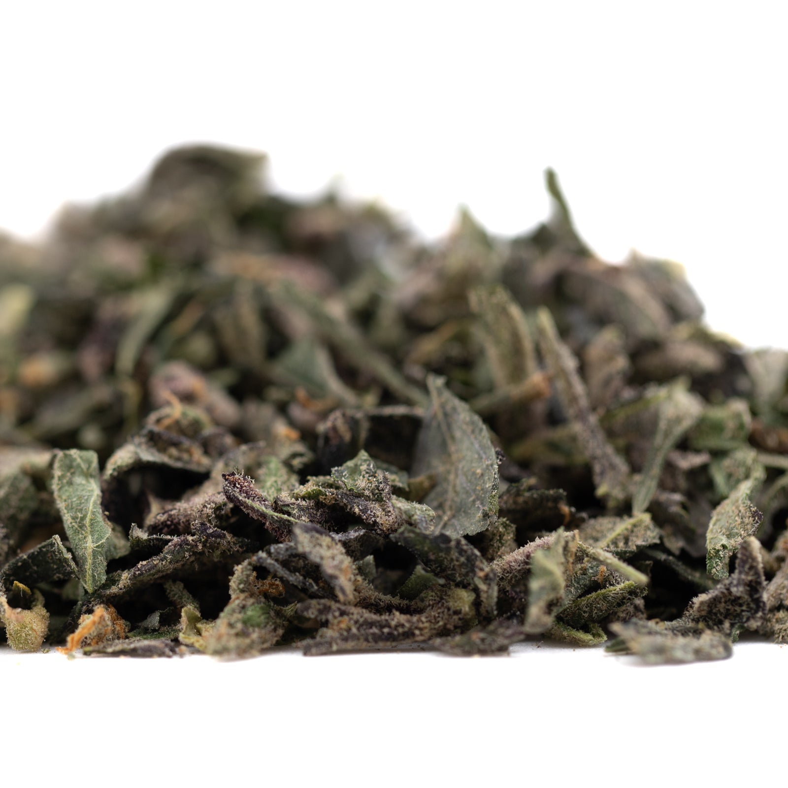 Dosi Mango THCa trim with green hemp flower leaves and speckles