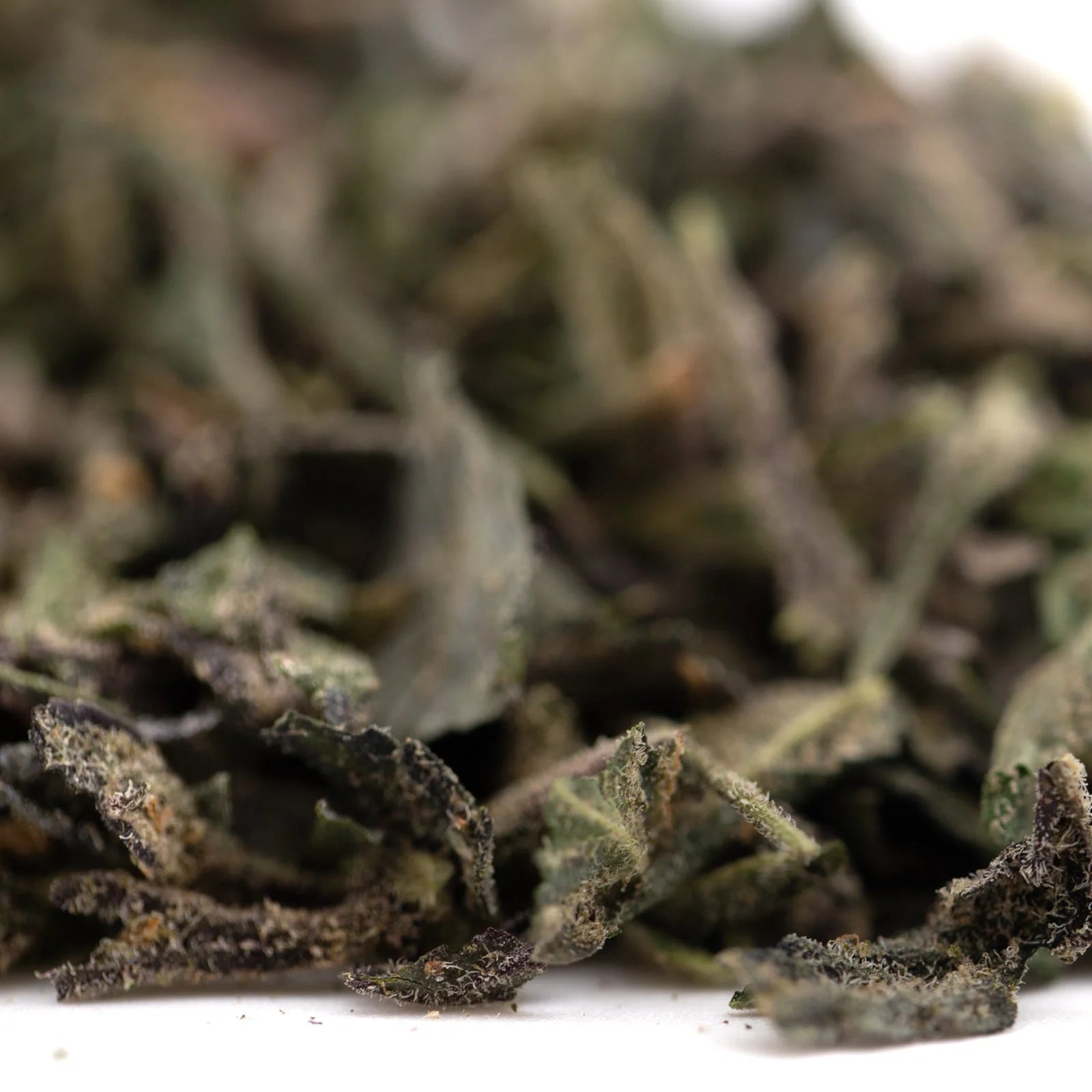 Dosi Mango THCa trim with green tea leaves, dried hemp flower