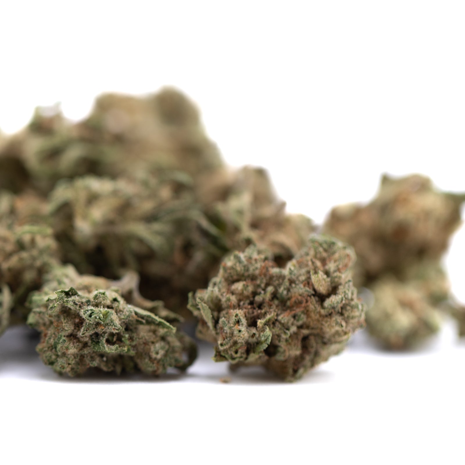 Durban Poison THCa Flower Smalls with green leaves and buds