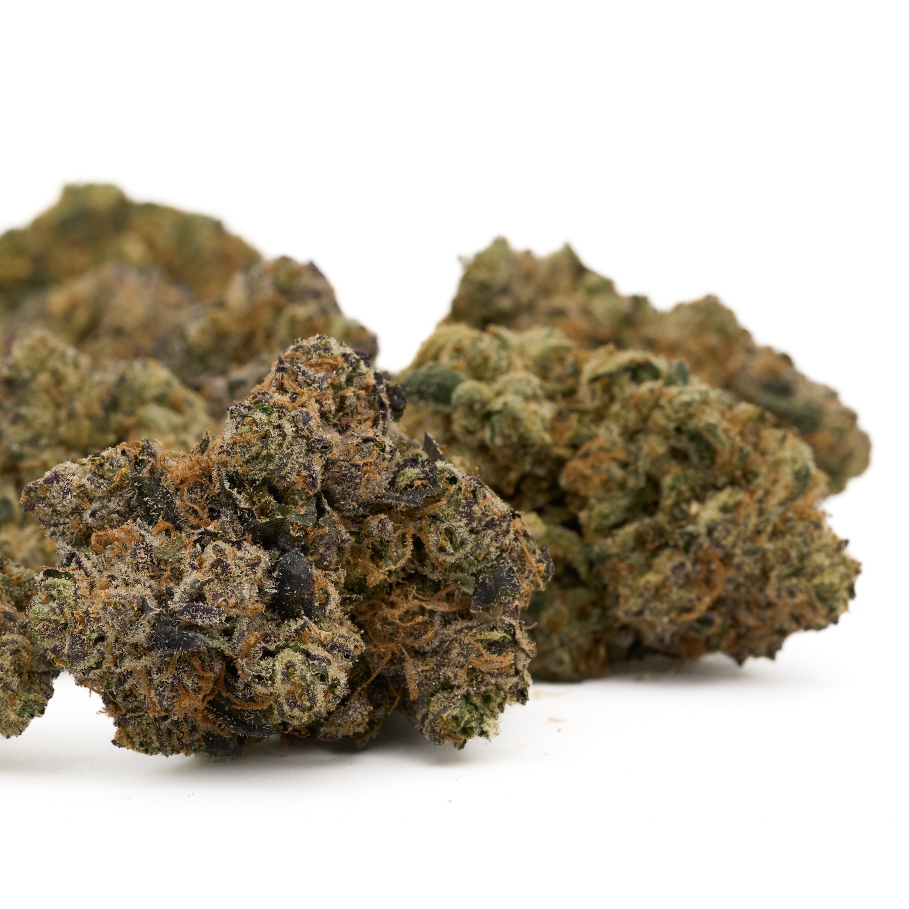 Dried Burmese Kush cannabis flower buds with trichomes and orange hairs for edible panties