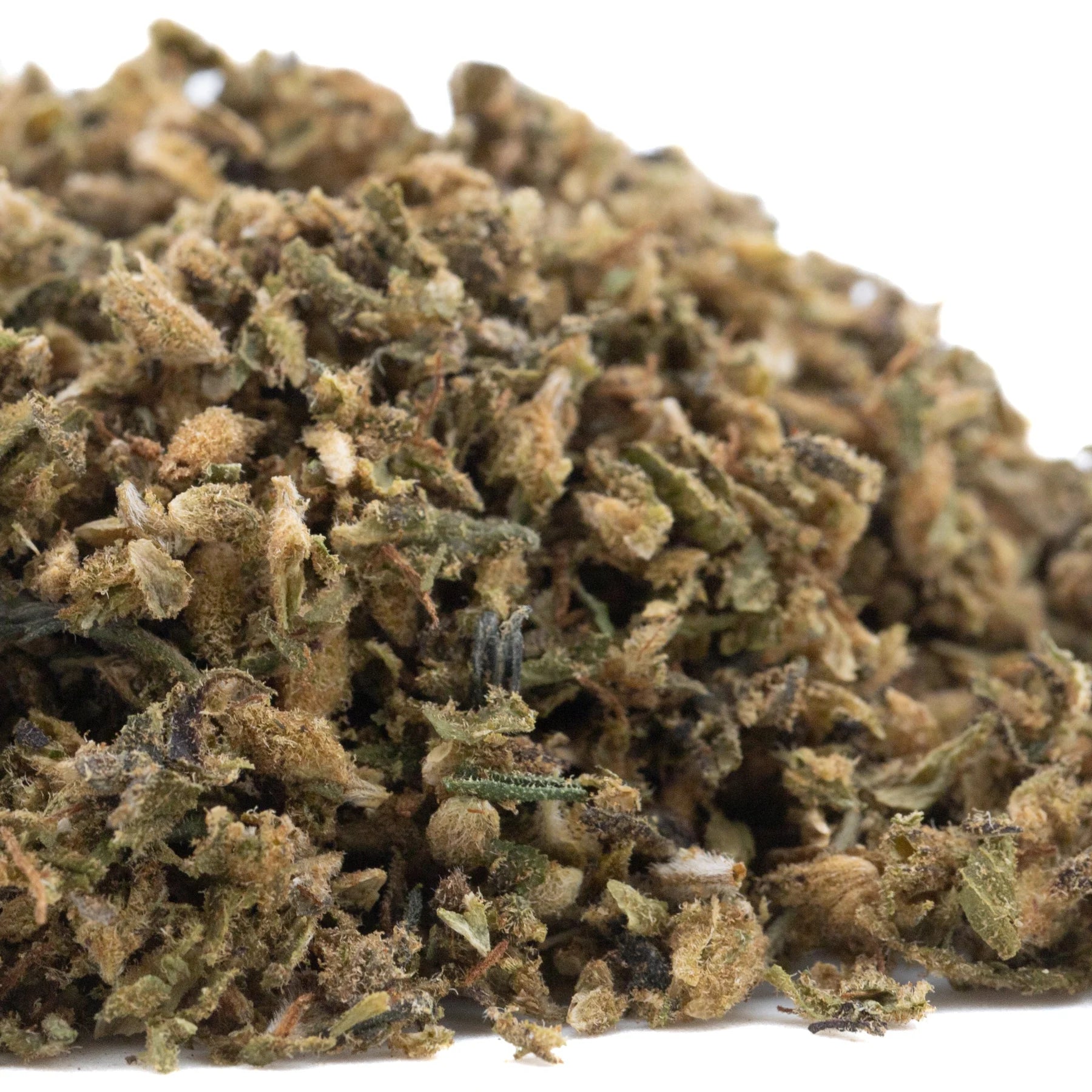 A pile of elektra full-term cbd hemp flower trim with green brown and tan hues showing its terpene profile