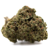 A dense green emerald fire thca flower bud with fine trichomes and brown pistils ideal for social enhancement