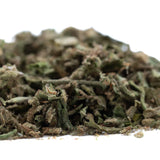 A pile of dried green and brown cannabis buds for face fat full-term thca trim wholesale hemp flower product