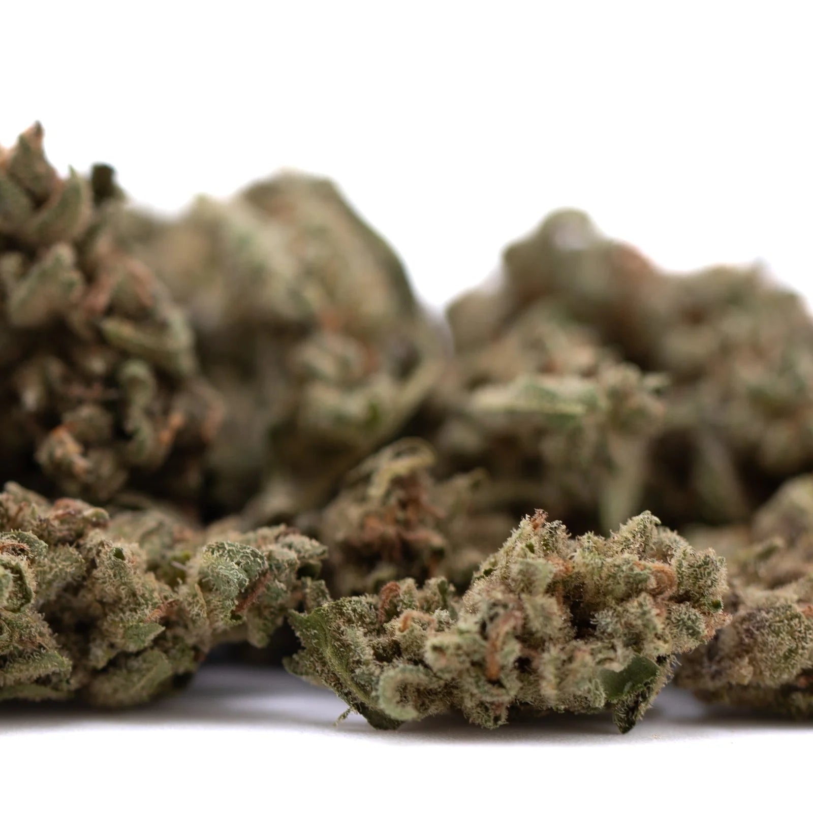 Face Fat THCa Flower Smalls: Dense green-brown marijuana bud with resin glands