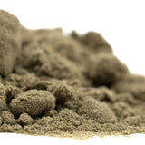A mound of fine olive-green face fat thca kief hemp flower showcasing all-day versatility with quantum positioning