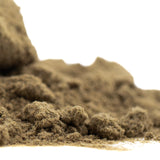 Brown Face Gas THCa Kief mound with rough clay-like hemp flower texture