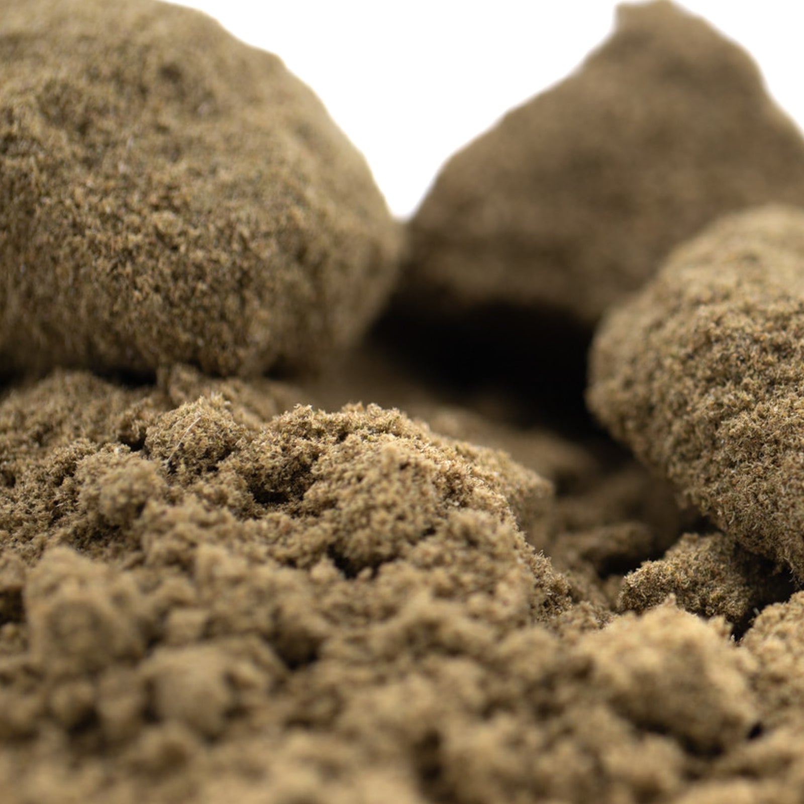 Sandstone rock pile in beige and brown hues for Face Gas THCa Kief hemp flower