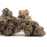 Frosty dense cannabis buds with dark green and purple hues from Fire OG THCa Indoor Flower