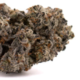 Dense Fire OG THCa Indoor Flower with dark purple, green hues, vibrant orange pistils, best THCA flower