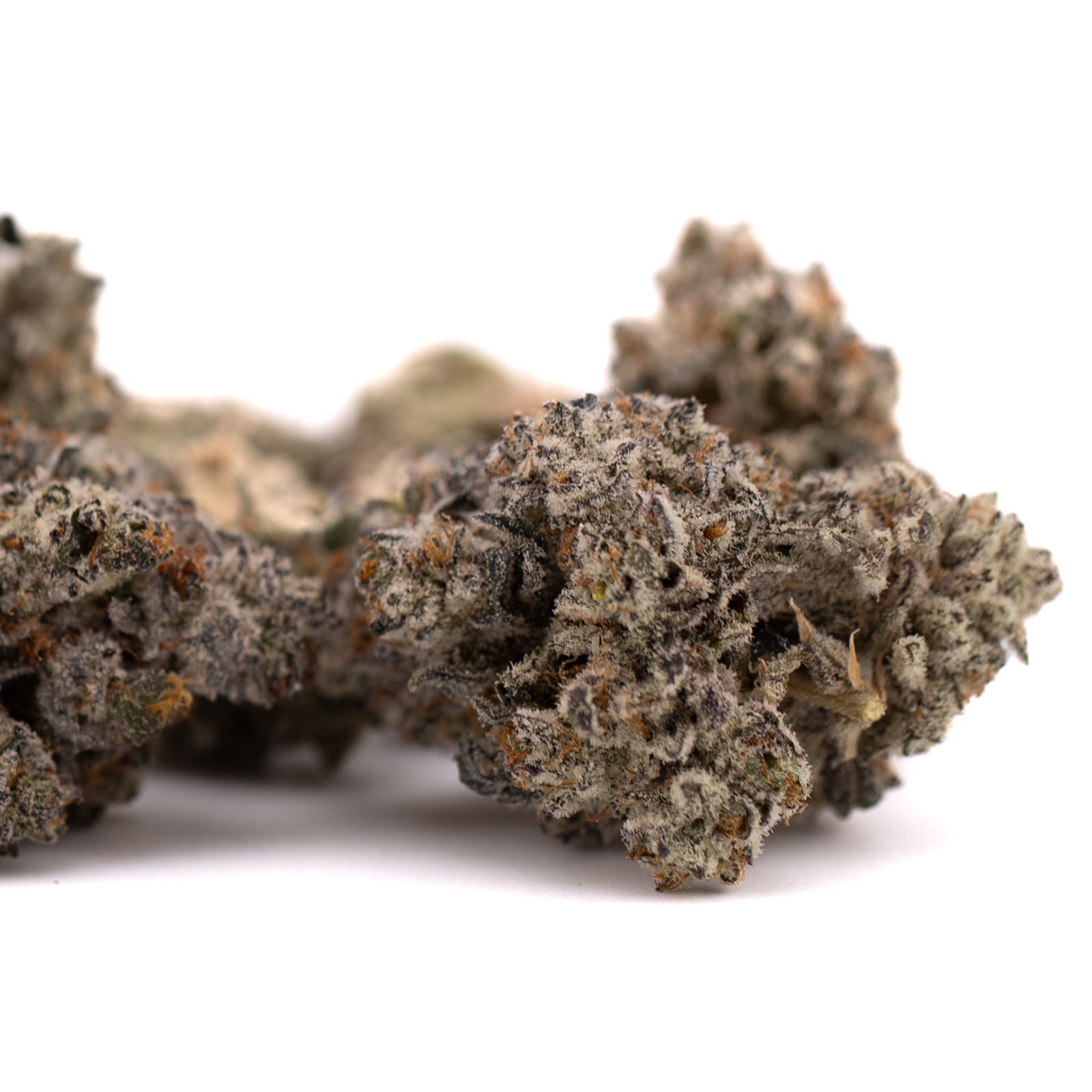 Dried cannabis buds rich in trichomes from Fire OG THCa Indoor Flower, a premium thca flower