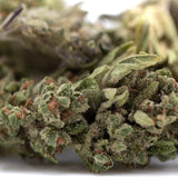 Premium Fog Dog THCa Flower Smalls with purple bud and trichomes
