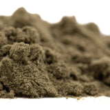 A mound of fine textured olive-green fog dog thca kief for hemp flower with candy x gravenstein offering a floating body high