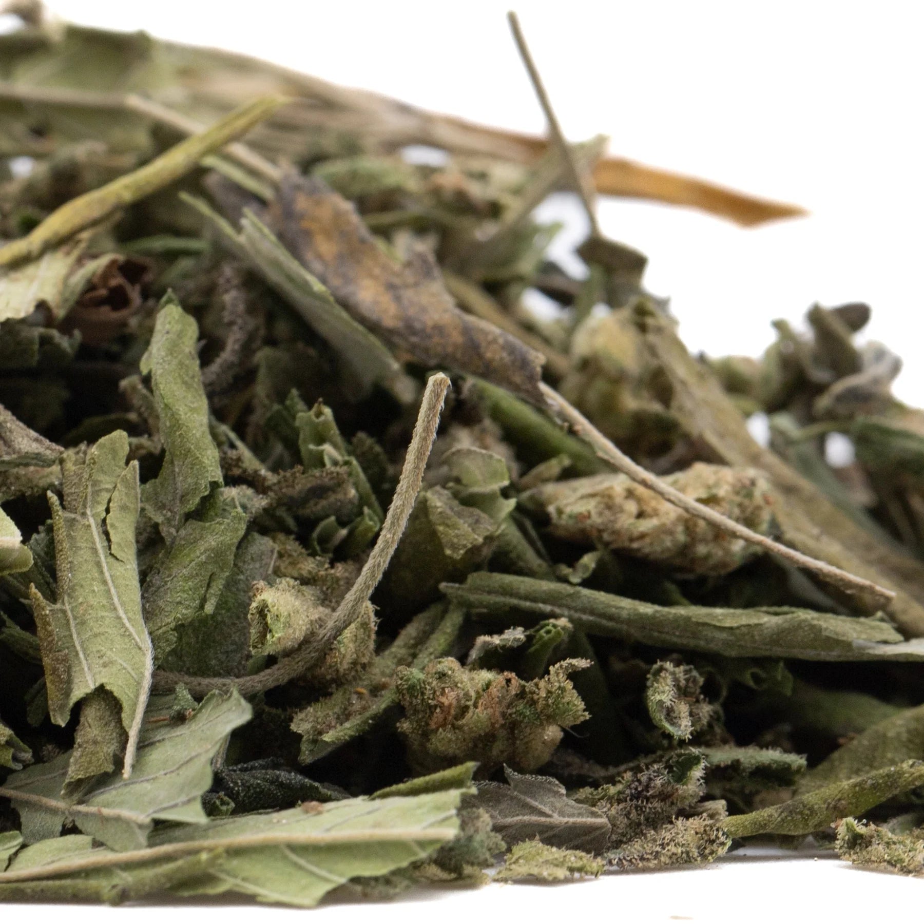 A pile of dried greenish-gray thca trim wholesale sage leaves with fuzzy texture and stems from fornicate greenhouse cultivation
