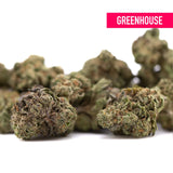 Gelato thca greenhouse smalls cannabis buds with dense textured surfaces covered in green and brown trichomes