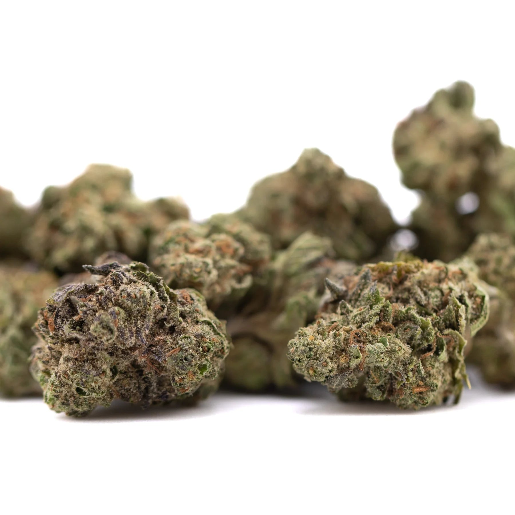 Green and brown thca flower cannabis buds with frosty texture in gelato greenhouse smalls wholesale pack