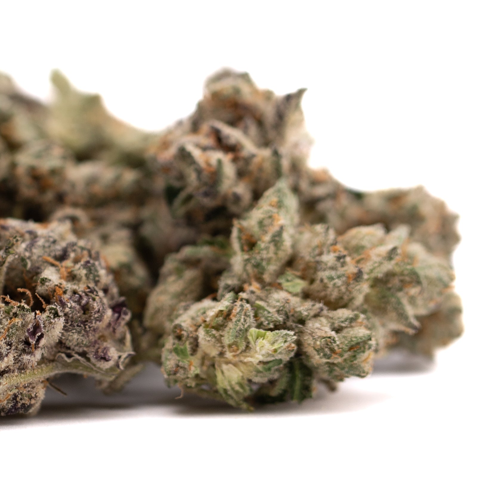 Dried Granny Crack Indoor THCa Flower with green crack buds, trichomes, and orange pistils