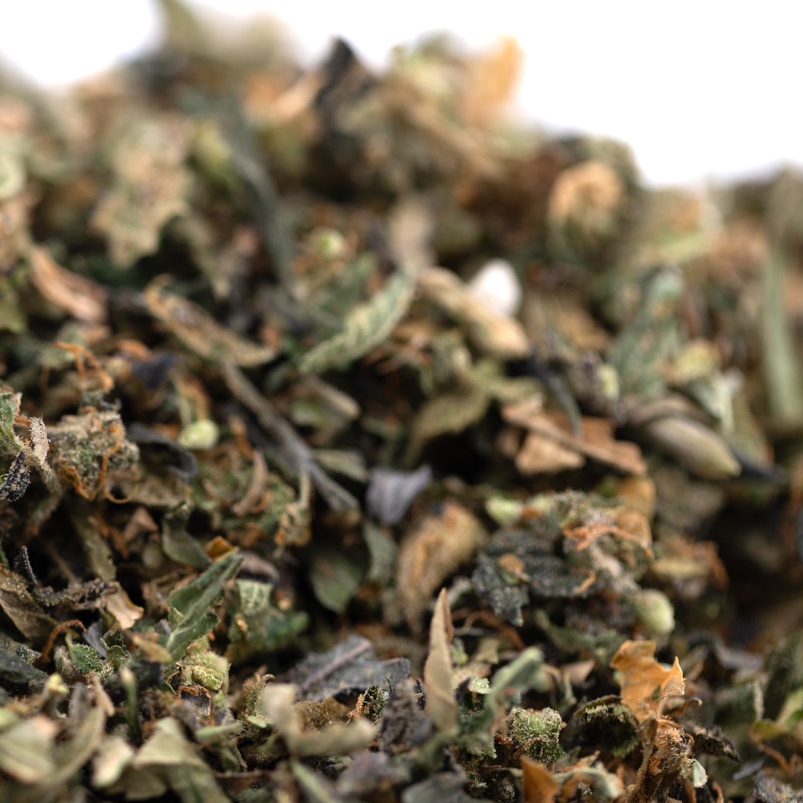 Close-up of dried green crack and sour apple herbs from Granny Crack Indoor THCa Trim Wholesale