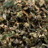 Finely ground dried herbs and spices for Granny Crack Indoor THCa Trim Wholesale 1LB featuring Green Crack and Sour Apple strains from Purple City Genetics