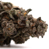 Close-up of Guava Z Indoor premium cannabis bud with trichomes and orange pistils