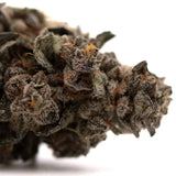 Close-up of Guava Z Indoor premium cannabis bud with trichomes and orange pistils