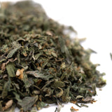 Dried crushed green herbs from Hooch Indoor THCa Trim Wholesale 1LB with trichome coverage