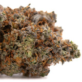Huckleberry Diesel THCA flower with dense trichomes, orange hairs, purple hues for sleep support