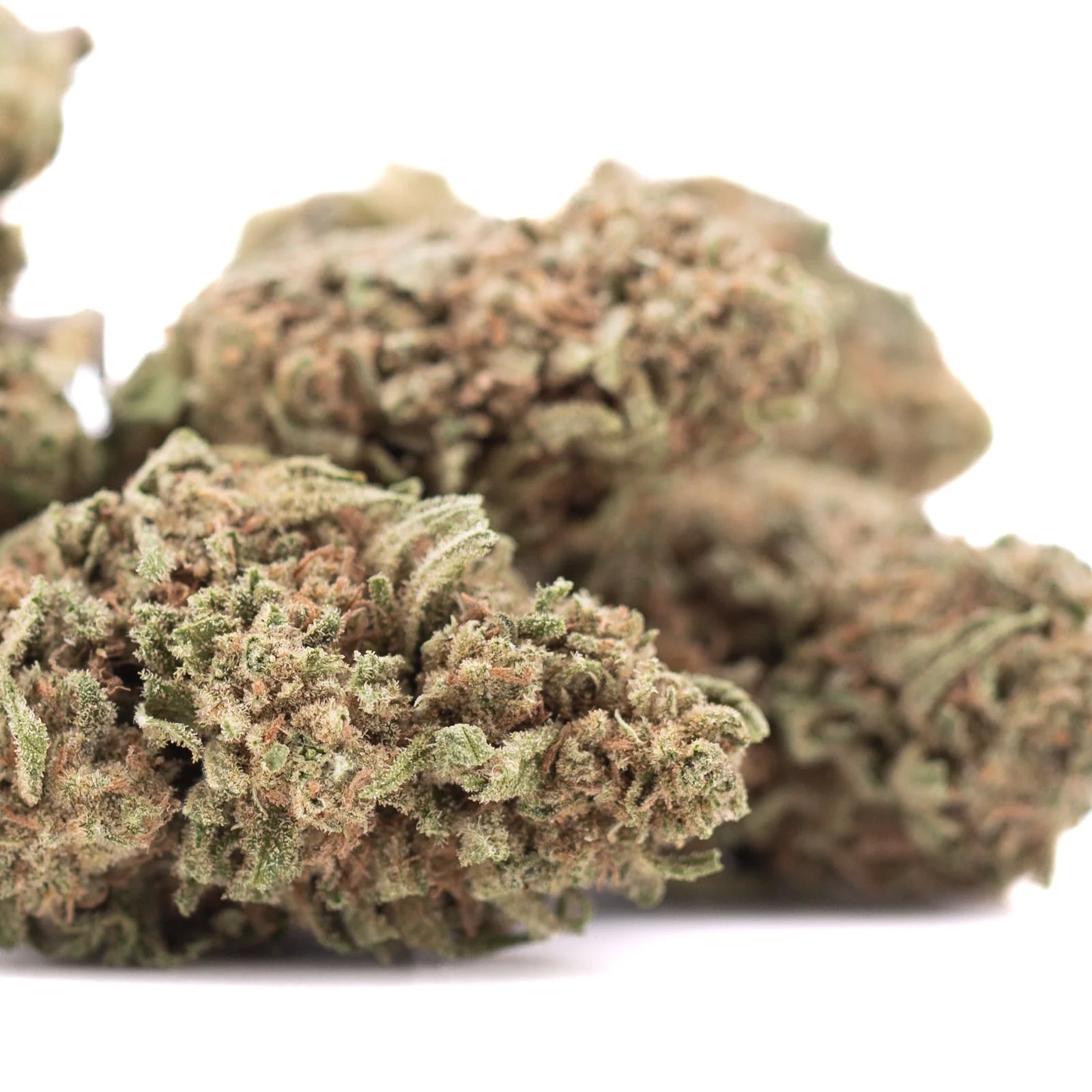 Green and brown humboldt dream thca hemp flower buds with dense frosty texture from humboldt county greenhouse