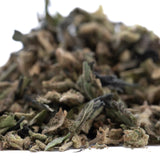 A pile of ice cream full-term thca flower buds with green and brown hues showing trichomes and terpene profile from indoor cultivation