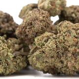 Mature jokerz nos thca hemp flower with dense green and brown trichomes near-maximum potency white runtz genetics