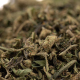 Jokerz THCa Trim Wholesale 1LB with dried ground cannabis, visible trichomes, white Runtz, Jet Fuel Gelato