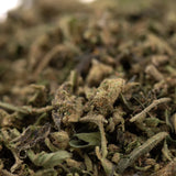Jokerz THCa Trim Wholesale 1LB with dried ground cannabis, visible trichomes, white Runtz, Jet Fuel Gelato