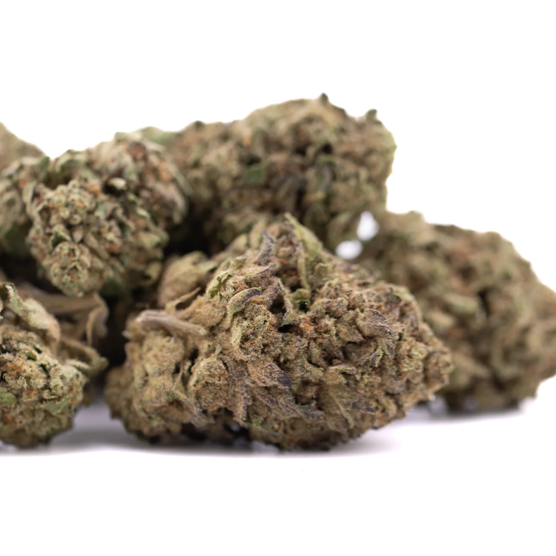 Dry lemon cherry gelato thca hemp flower buds with dense green and brown texture from greenhouse cherry pie strain