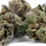 Green and purple frosty lemon octane cbd smalls flower with textured smalls hemp flower buds
