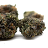 Purple cannabis buds with frosty trichomes from Lemon OG Indoor THCa Flower Wholesale