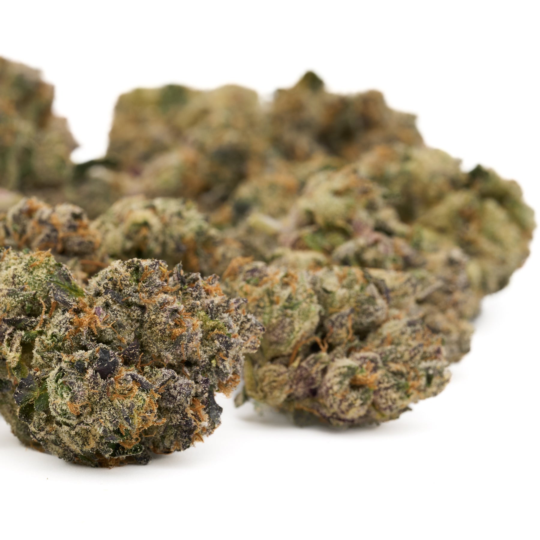 Dried cannabis buds with green purple and orange hues from Love Affair Indoor THCa Flower