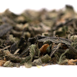 Loose-leaf green tea with orange specks from Lung Buster Indoor Trim Wholesale 1LB