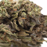 Magik cbd hemp flower full-term with dense green cbg hemp flower coated in frosty trichomes and brown pistils