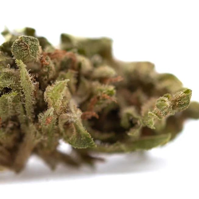 Dense green magik cbd hemp flower smalls full-term bud with trichomes and orange pistils for cbd smalls use