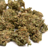 Maverick CBD Hemp Flower with green and brown hues covered in trichomes, Oregon CBD flower