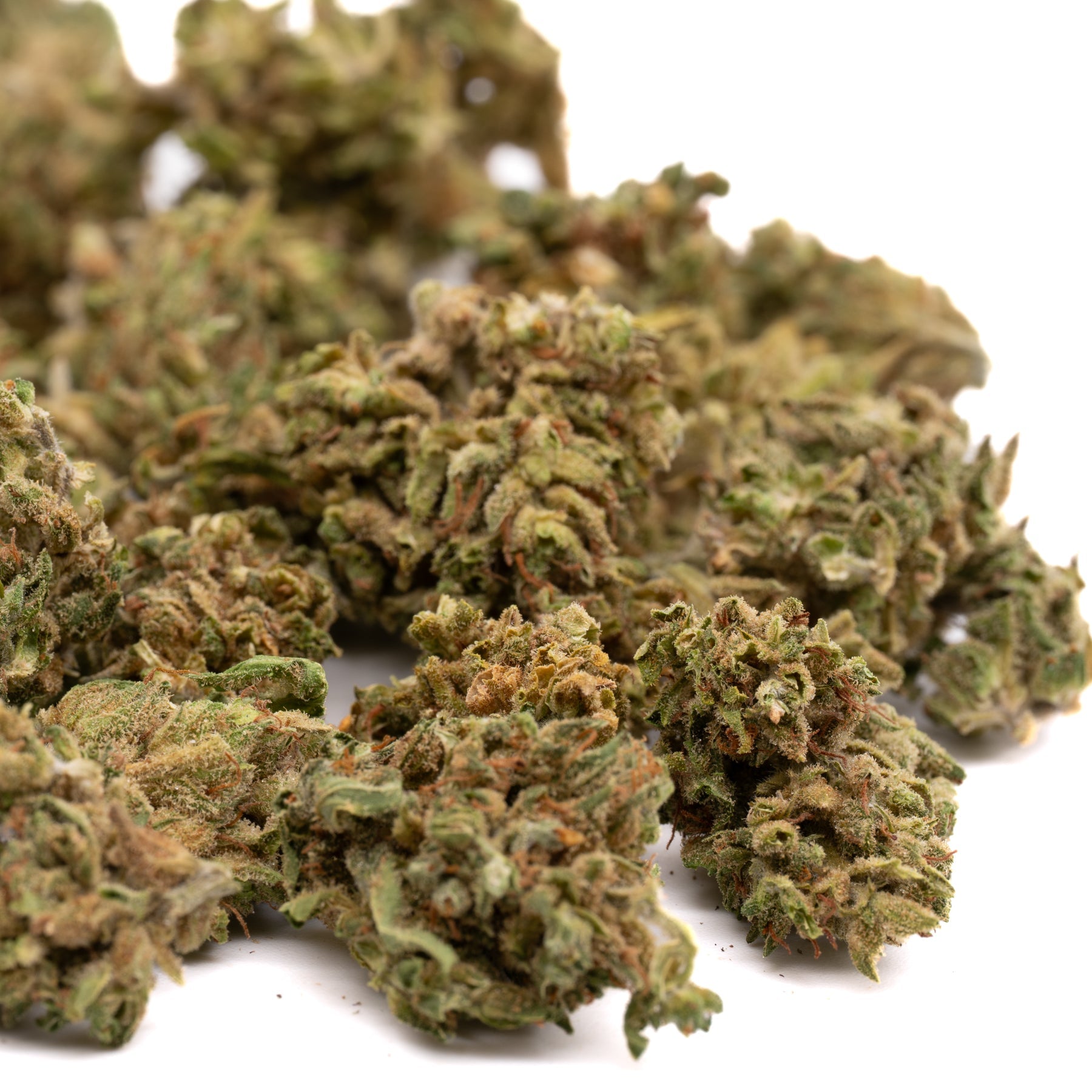 Pile of dried CBD hemp flower small buds from Maverick CBD Hemp Flower Smalls