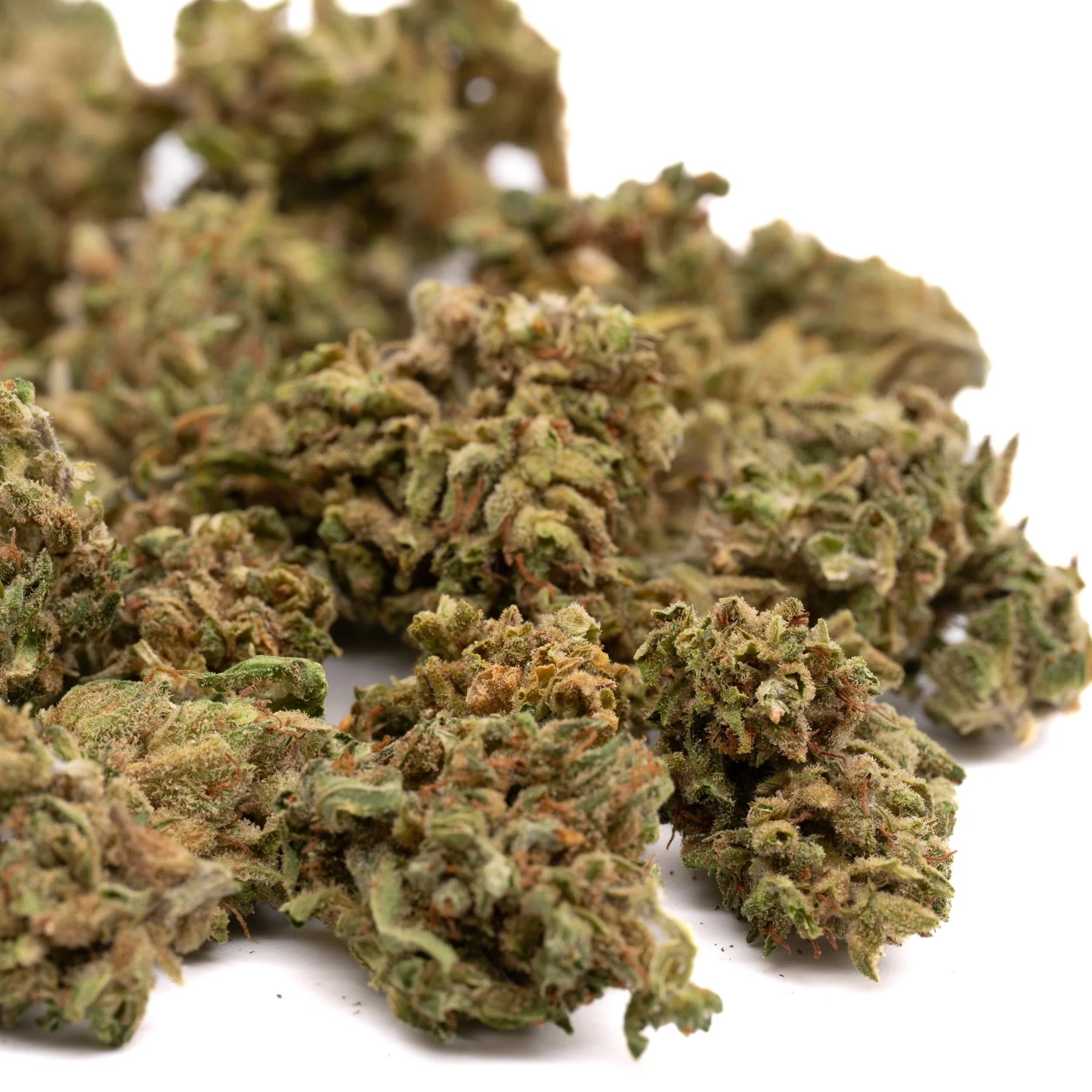 Pile of dried CBD hemp flower small buds from Maverick CBD Hemp Flower Smalls