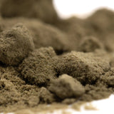 Clumpy earthy brown coarse granular texture of mega gummie bearz thca kief for enhanced cbd hemp flower use
