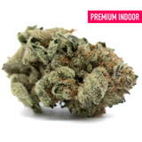 Dense Moroccan Peaches THCa Flower with trichomes and orange pistils for wholesale hemp flower