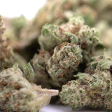 Lush green nectarine jelly thca hemp flower greenhouse smalls with dense frosty trichomes and orange pistils