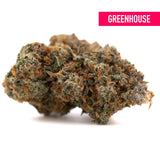Green and orange Nectarine Jelly THCa hemp flower bud with white trichomes, Greenhouse craft cannabis